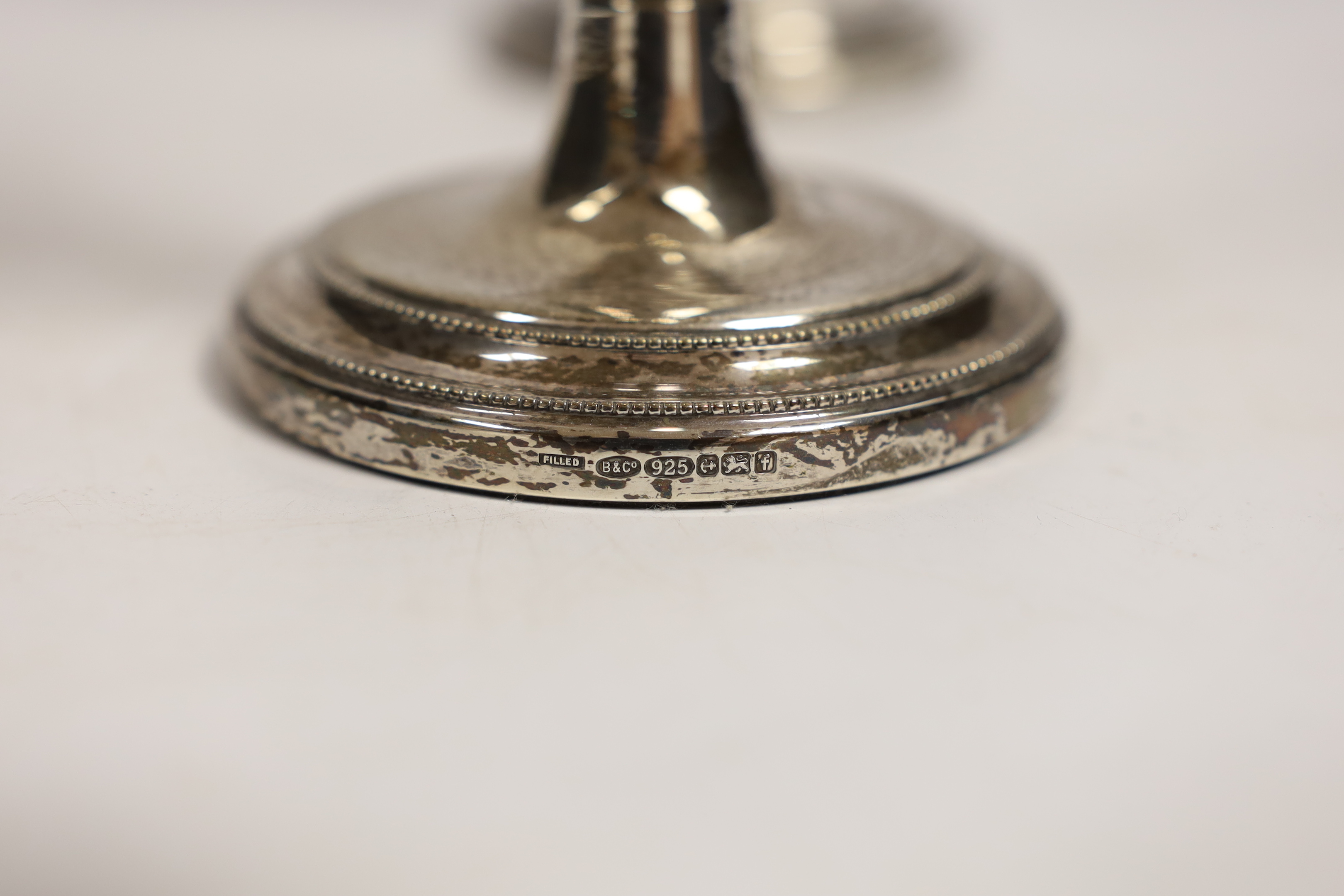 A pair of modern silver mounted candlesticks, London, 2005, 22.3cm.